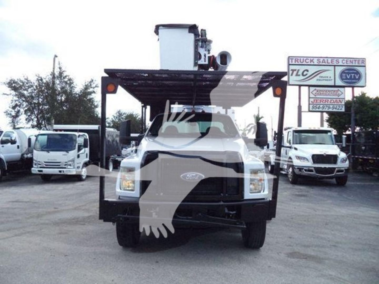 2017 Ford F750 bucket truck front view showing bucket lift equipment and grille with Ford emblem.