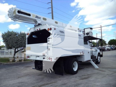 Altec bucket truck mounted on a white Ford F750 cab with boom extended, in-service utility bucket truck showing rear and side views.