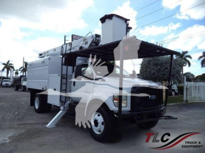 Ford F-750 bucket truck with service body and boom, front grille and roof mounted equipment visible, cargo ladder deployed.