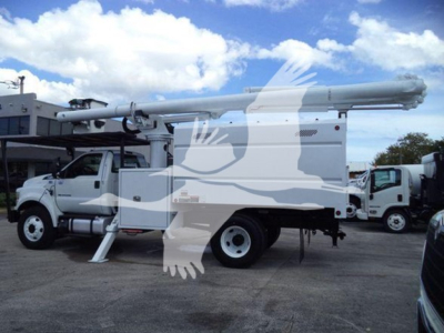 2017 Ford F750 bucket truck side view showing boom lift extended, service body, towing mirrors, and dual rear wheels.