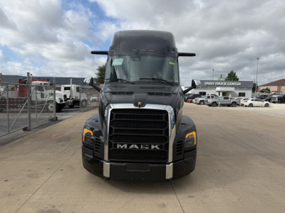 Mack PR64T76H conventional sleeper truck front view showing large grille and Mack emblem.