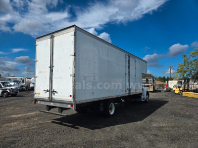 Kenworth box truck rear and side view showing enclosed cargo area and dual rear doors.
