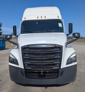 Truck front view of a white 2023 Freightliner Cascadia 126 with black grille and bumper, large side mirrors.