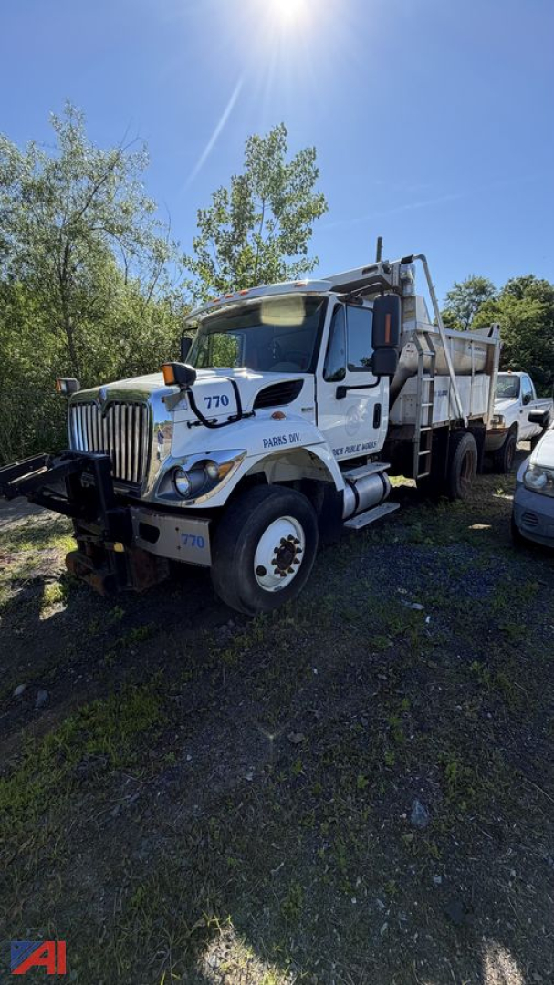 Truck dump bed International Workstar 7400 showing front grille and dump body with number 770 on door and hood.