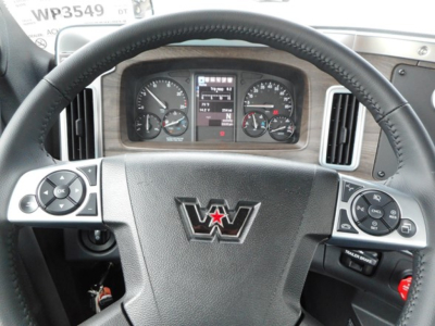 Western Star 49X steering wheel and dashboard visible with instrument cluster and controls.