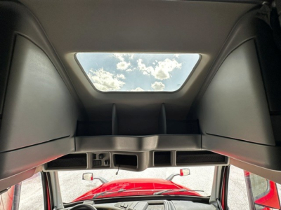 Volvo VNL64T860 sleeper cab interior roof hatch and overhead console with skylight view