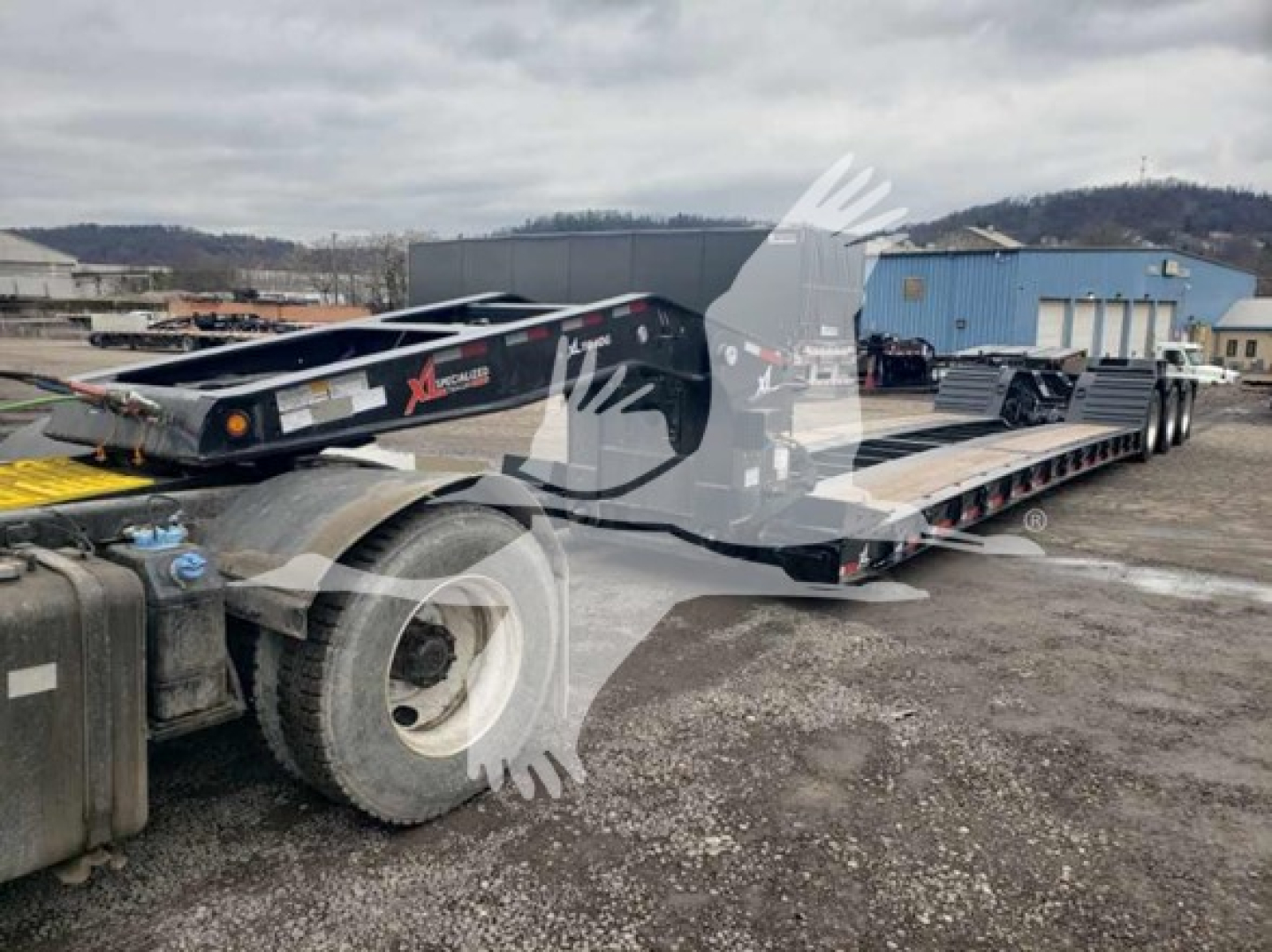 XL Specialized heavy trailer showing 55 ton lowboy with extendable gooseneck and dual rear axles, VIN 4U3J05332TL025059, stock TL025059.