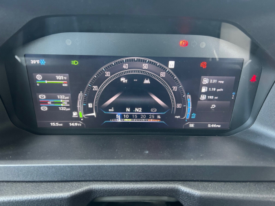 Mack PR64T instrument cluster displaying digital gauges, speedometer arcs, and multiple readouts on a truck dashboard.