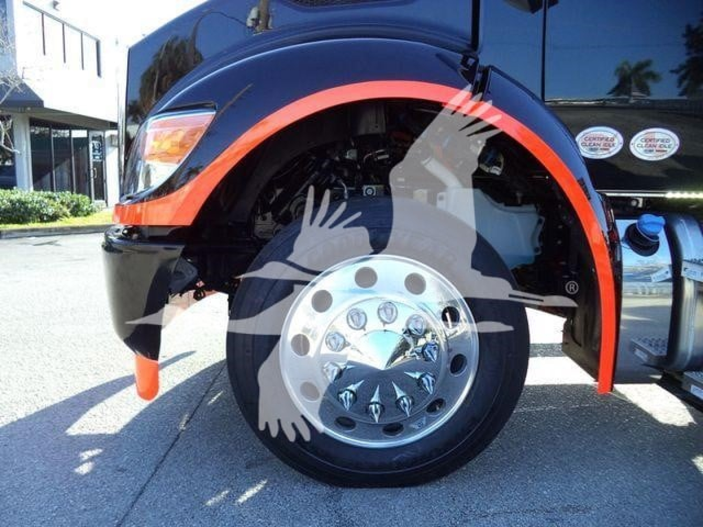 Kenworth T280 front wheel well and fender with orange accent, chrome wheel, visible suspension components