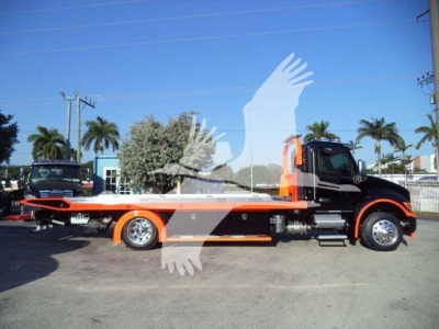 Kenworth T280 rollback truck side view showing flatbed with orange and black color scheme, cab with chrome exhaust, and awaiting sale signage.