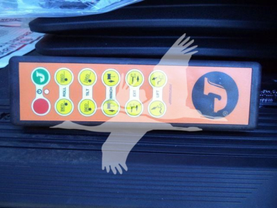 Kenworth truck diagnostic panel with multiple yellow circular indicators and a green power symbol, mounted on a black surface.