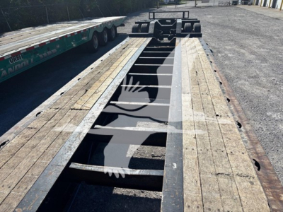 XL Specialized XL80HDG lowboy trailer frame showing wood deck and central steel channel