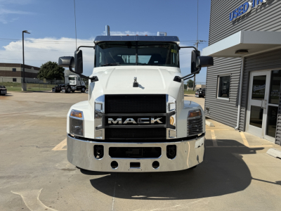 Front view of a white 2020 Mack AN64T conventional daycab truck with large grille and bumper, clear windshield, mirrors, and headlamps visible.