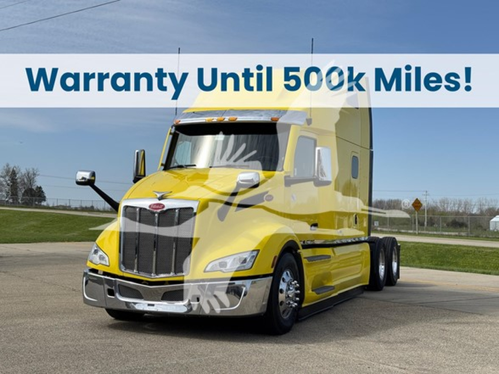 Peterbilt 579 conventional sleeper truck in yellow with warranty banner reading 'Warranty Until 500k Miles!' and stock/VIN details overlay.