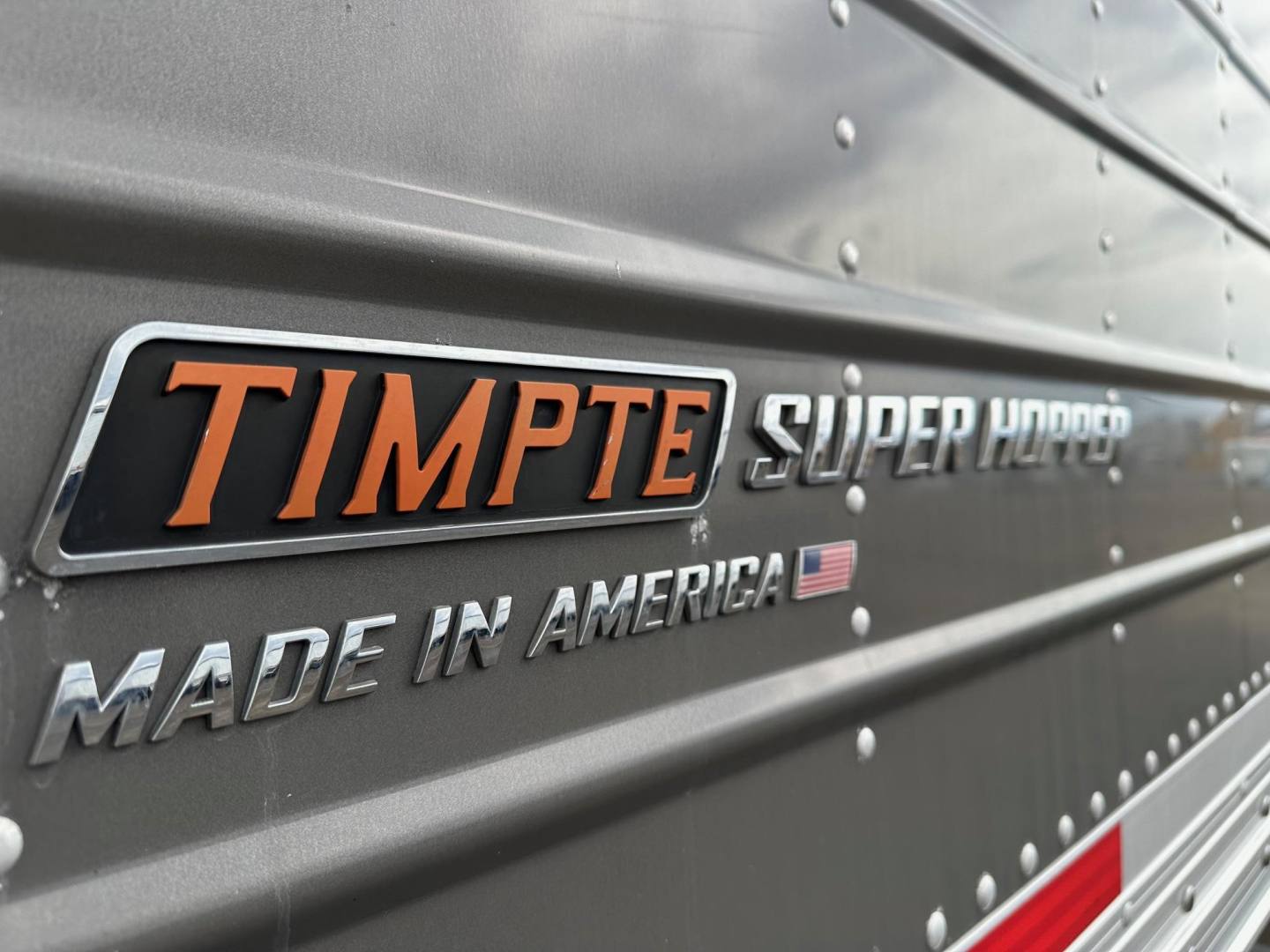 Timpte Super Hopper trailer side showing MADE IN AMERICA and Timpte logo