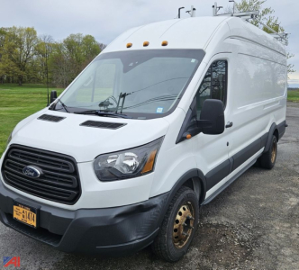 Ford Transit high top cargo van 2018 front left view showing front grille headlights and side profile with wheel wells