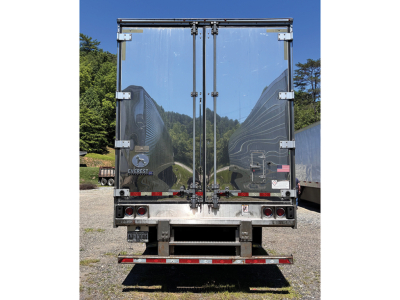 Great Dane Everest SS trailer rear view showing dual doors, reflective rear bumper, and metal frame with hinges and latches.