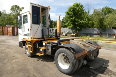 Kalmar Ottawa YT30 yard truck chassis and cabin view showing side profile and rear wheels
