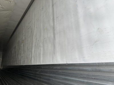 Trailer interior wall and ceiling of a used Utility 3000R reefer trailer with metal side panels.