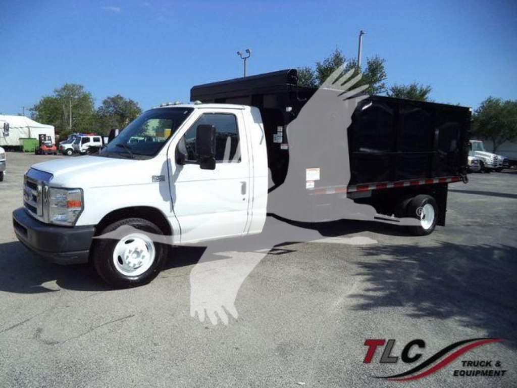 Ford E450 dump truck side view showing white cab and black dump bed with logo overlay.