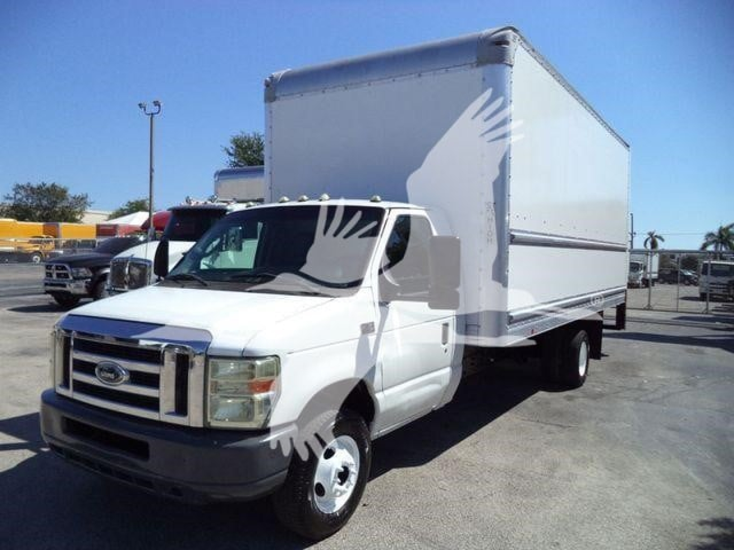 Ford E-Series box truck with large cargo box in white, front cab view, VIN 1FDXE4FS6BDA96725, stock T96725, used.