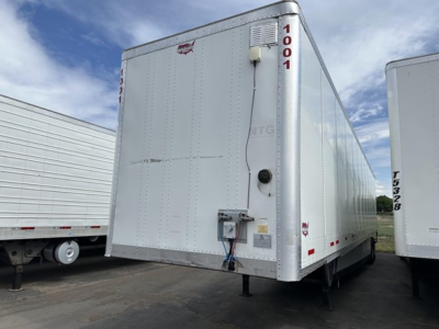 DuraPlate 53' air ride dry van trailer rear and side view showing back doors and wheel area.
