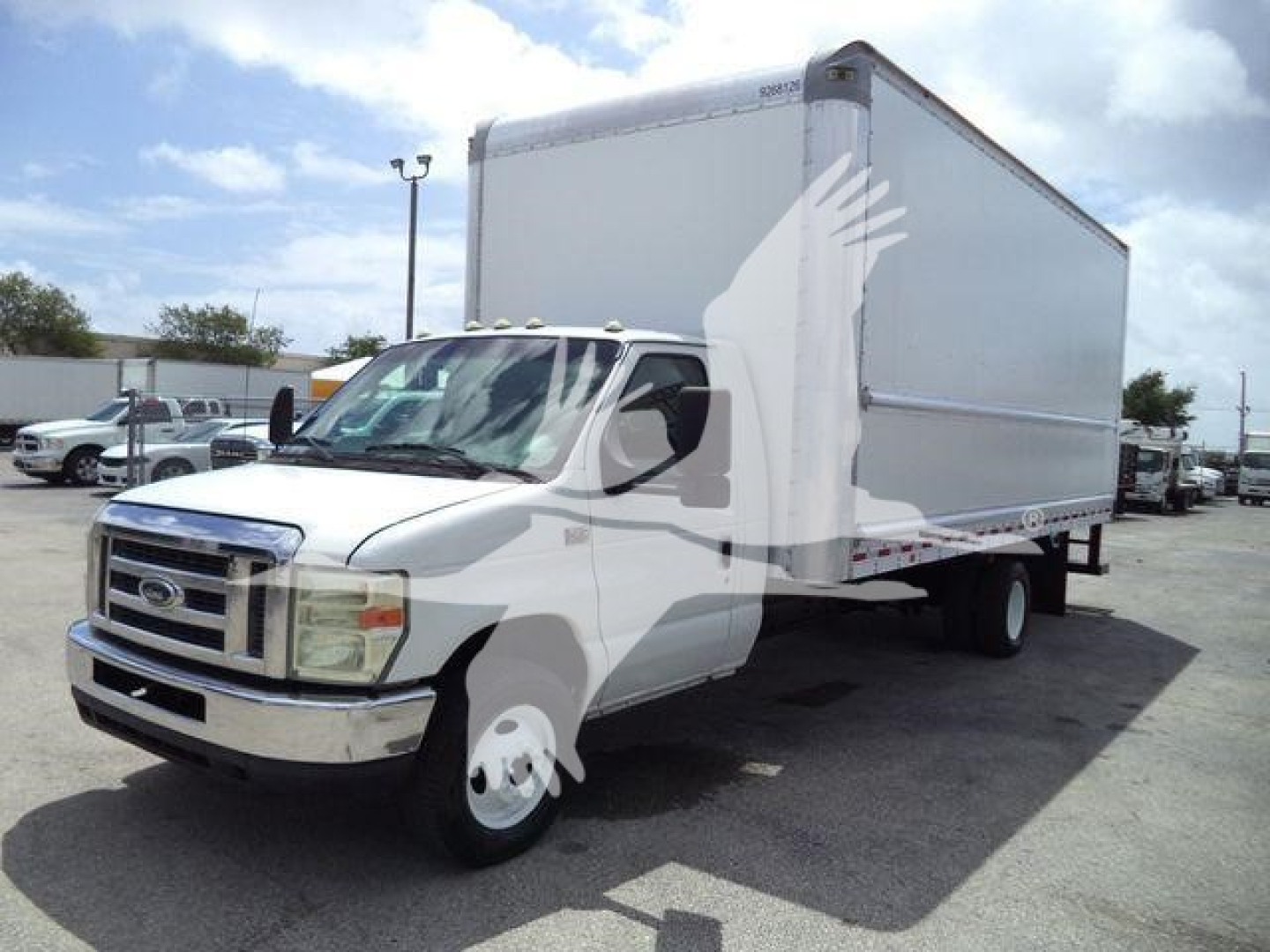 Ford E450 box truck front-left view showing cab and large box cargo area.