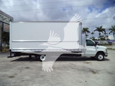 2011 Ford E450 box truck side view showing cargo box, cab with front wheel and rear wheel visible.
