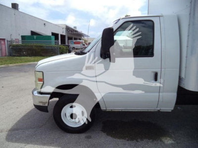 2011 Ford E450 box truck side view showing cab and front wheel