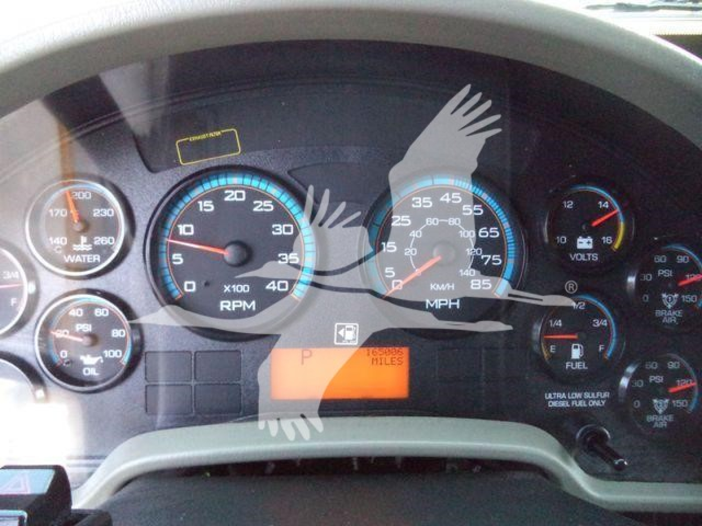 Dashboard view of a 2019 International 4300 truck showing gauges including RPM, speed, fuel, and warning indicators.