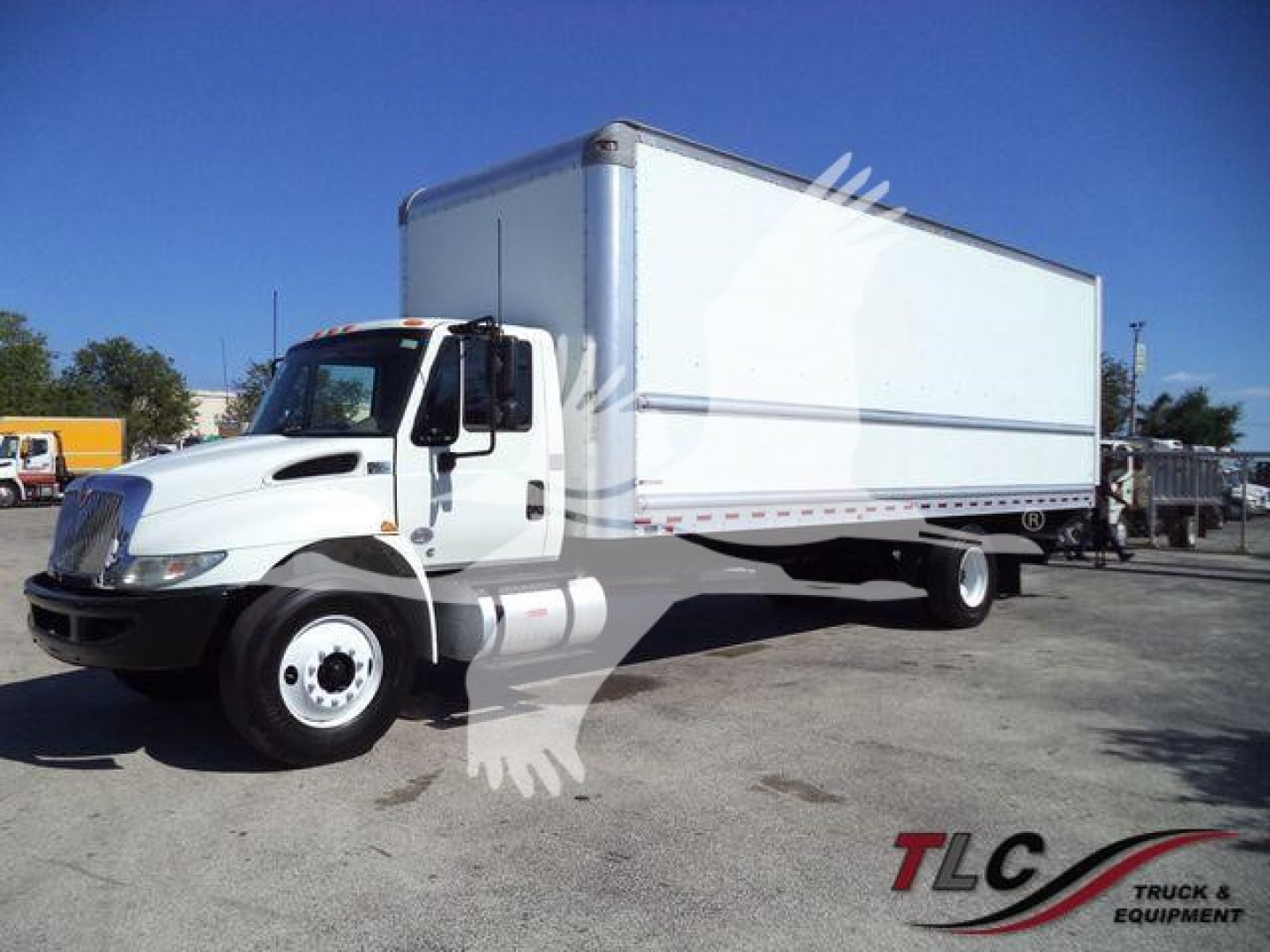 Box truck 2019 International 4300 side view showing cargo box and cab with stock number T91718FM.