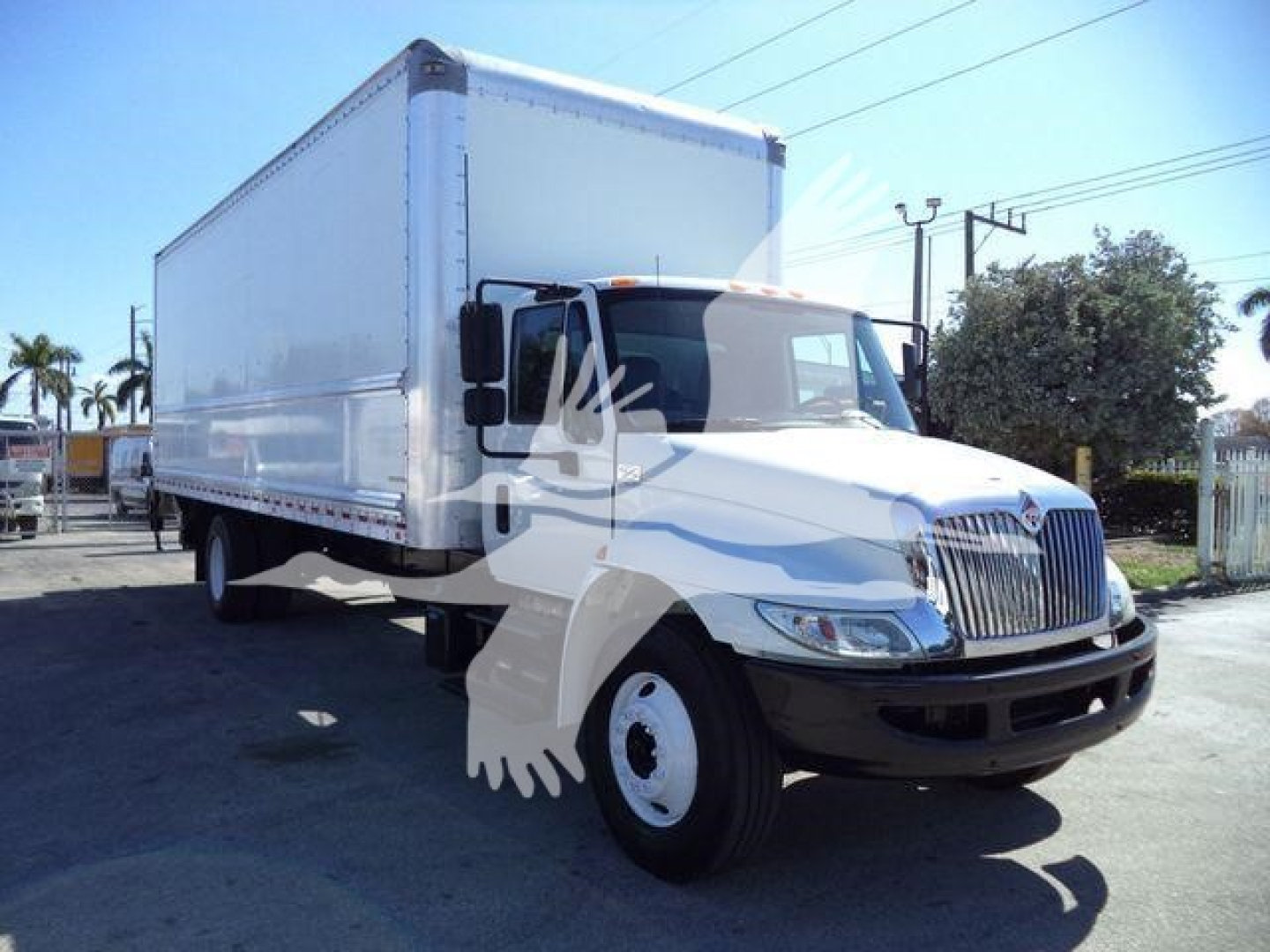 International 2019 truck with box body and dual rear doors showing Cab and cargo area.