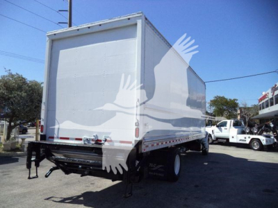 Box truck rear view showing cargo area and taillights; white 2019 International 4300 box truck on a lot.
