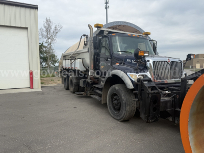 2007 International WorkStar 7600 plow truck with front mounted snow plow and dump bed, black and gray, stock number 7177-63, VIN 1HTWXAHT17J543343, in-service vehicle.