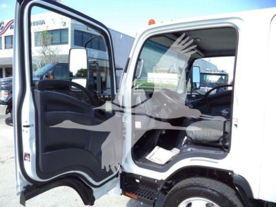 Isuzu NPR-HD cab interior with open driver and passenger doors showing dashboard and seating.