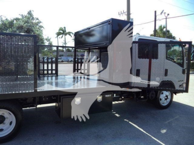 Isuzu NPR-HD truck with flatbed and utility box, side cab view shown.