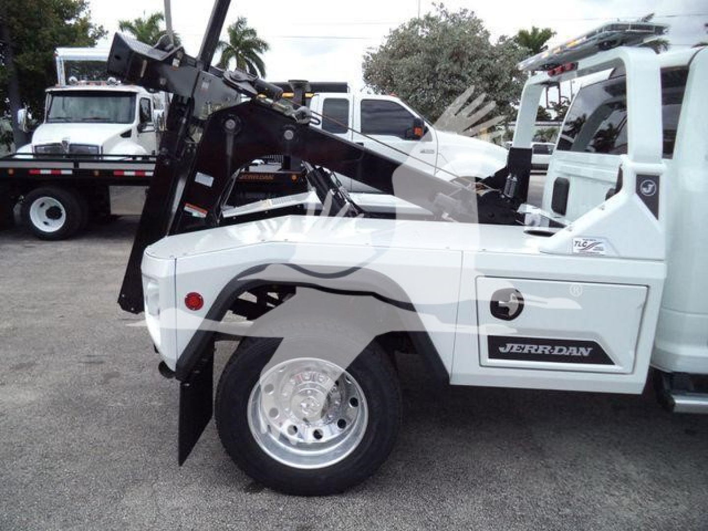 Ram 4500 tow truck with front wheel and Jerr-Dan integrated tow arm visible