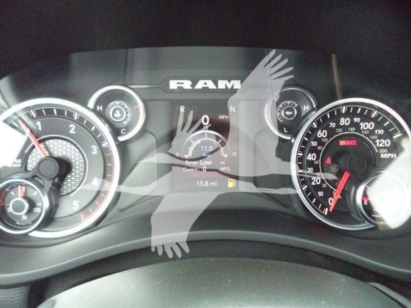 Dashboard of a Ram 4500 truck showing speedometer, tachometer, and center digital display with RAM logo.