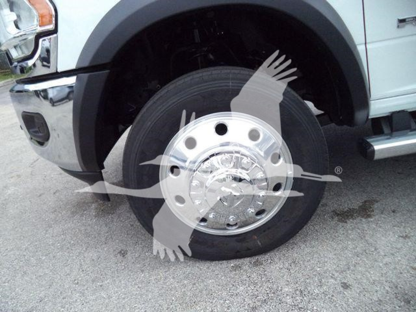 Ram 4500 front wheel and fender showing chrome hubcap and N/A tire tread