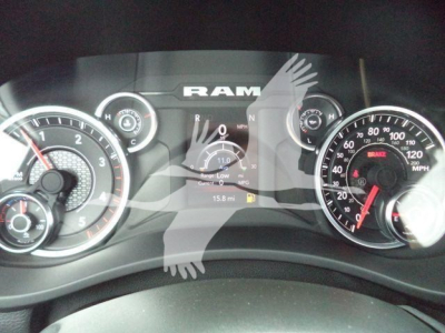 Dashboard of a Ram 4500 truck showing speedometer, tachometer, and center digital display with RAM logo.