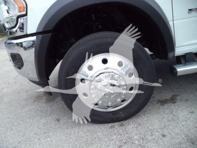 Ram 4500 front wheel and fender showing chrome hubcap and N/A tire tread