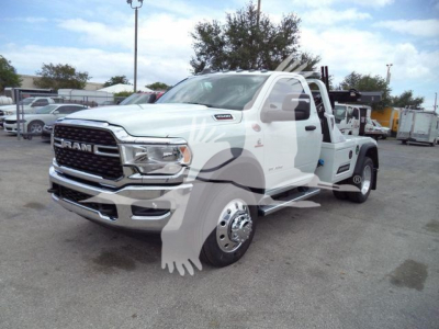 2024 Ram 4500 SLT truck in white showing front grille and side profile with winch category branding.