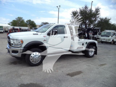 Ram 4500 tow truck with winch winch assembly in rear; side view showing front grille, dual rear wheels, and towing bed. Visible text on vehicle includes RAM badge and Power Wagon? Not legible. Stock number overlay not part of vehicle; no ot