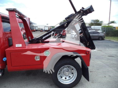 Ram 4500 SLT winch truck side view showing JerrDan mount and hydraulic winch system