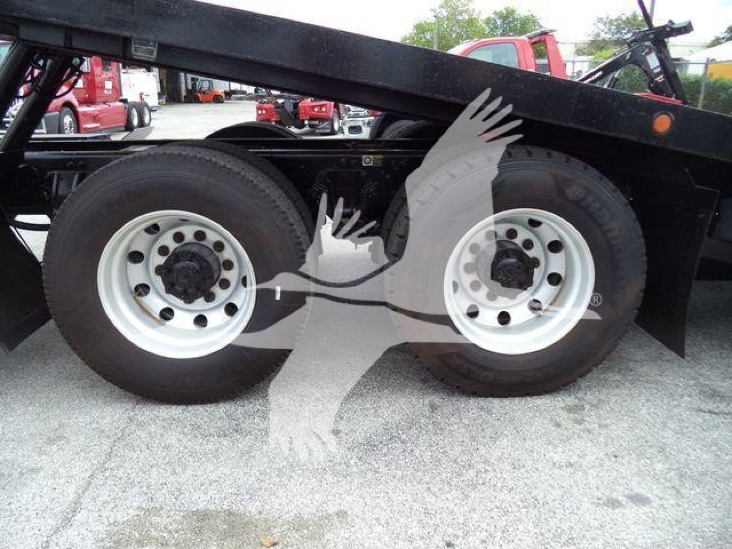 Peterbilt 348 rollback truck dual rear wheels showing chassis and wheel rims