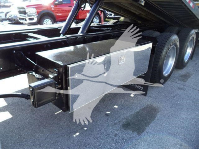 Freightliner M2 106 rollback truck undercarriage showing implement toolbox and rear axle set.