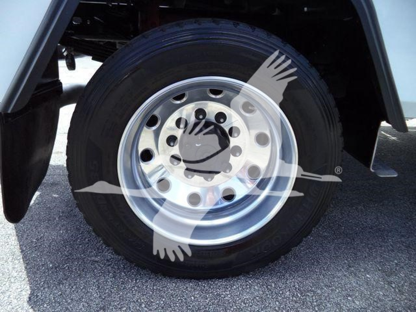 Wheel and tire on Ram 4500 truck showing steel wheel with multiple holes and hub, part of wheel well and fender; no readable labels visible in image.