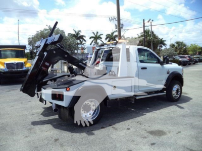 Ram 4500 tow truck with mounted winch and equipment viewed from rear-left side.