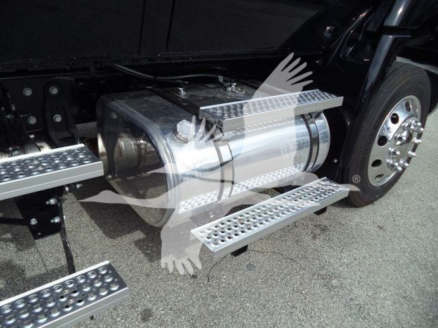 Truck fuel tank along with side steps and wheel showing 2026 International MV rollback truck