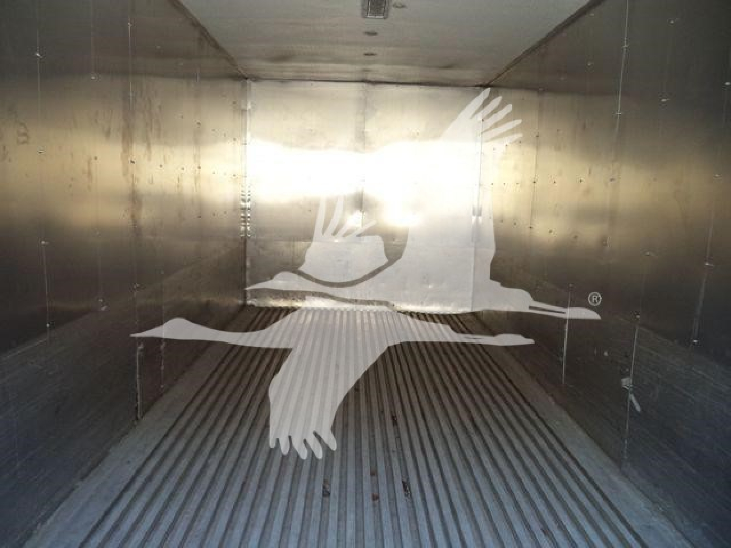 Empty cargo area of a 2019 International Durastar 4300 truck in a metallic trailer interior.